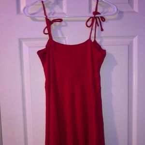Red mini dress with tie up straps.